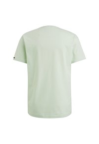 Lys grøn bomulds t-shirt med korte ærmer, rund hals og en glat overflade. Har et lille logo-accent tæt på kanten.