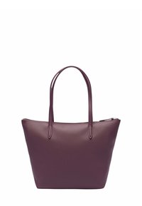 Bolso tote de cuero morado con textura suave, forma cónica y dos asas. Presenta un cierre de cremallera y detalles de diseño sutiles.