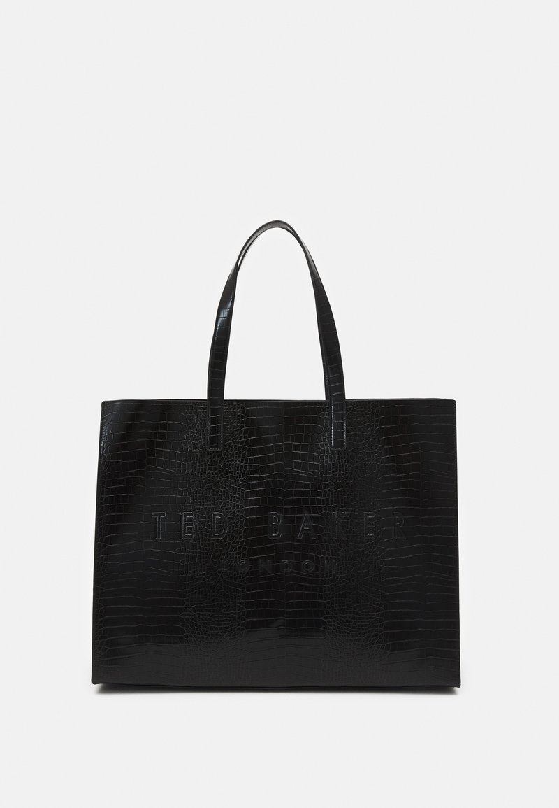Crna torba s uzorkom krokodilske kože, utisnutim logotipom "TED BAKER LONDON" i dvije čvrste ručke. Glatka, sjajna završna obrada.