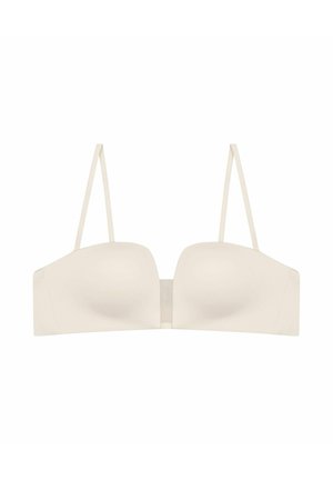 Beige, strapless bra with smooth cups and a seamless design. Adjustable thin straps and a soft band provide support and comfort.