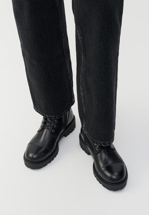 KENOVA - Lace-up ankle boots - black