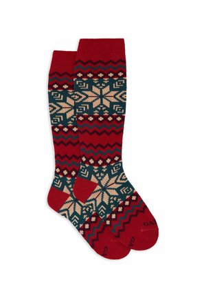 Calze al ginocchio con un motivo di fiocchi di neve rosso, verde e beige. Parte superiore a costine con motivi a zig zag e a diamante. Tessuto a maglia morbida.