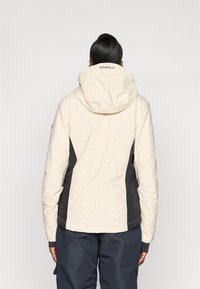 Beige naiste kapuutsiga jakk, millel on tekstuuriline muster, tumedate külgpaneelide ja logoga selja kaeluses.