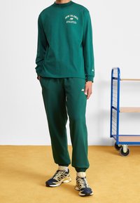 New Balance Långärmad tröja - dark green