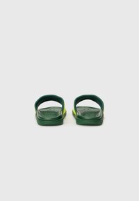 Lacoste SERVE - Pool slides - dark green/yellow
