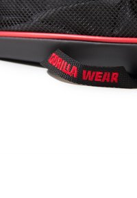 Black mesh bag with red accents, featuring a fabric handle labeled "GORILLA WEAR" in bold red text, textured surface and durable design.