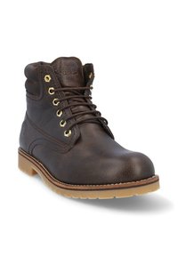 Bota de trabajo de cuero marrón con punta redondeada, ojales de hardware dorado y suela de goma color beige. Presenta un collar acolchado y una superficie texturizada.