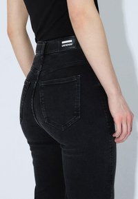 Dr.Denim MOXY STRAIGHT - Straight leg jeans - black mist