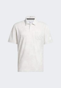 Polo gris clair avec un motif subtil et texturé, manches courtes, col et une poche poitrine unique. Comprend une étiquette de marque à l'intérieur.