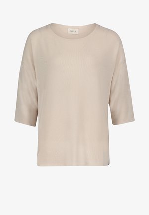 Haut en tricot beige à manches courtes avec un col rond, coupe ample et motif texturé. Le tissu doux améliore le confort et la respirabilité.