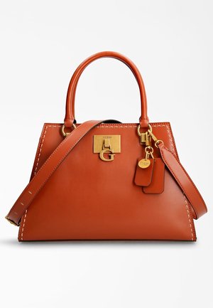 Sac à main en cuir marron avec un design structuré, des accessoires dorés et des détails de couture. Comprend une bandoulière amovible et une étiquette de marque.