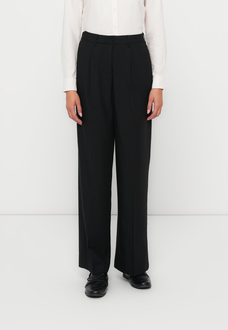 Black wide-leg trousers made from a smooth fabric, featuring a pleated design, with a high waist and subtle front creases.