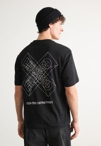 HUGO - NUFRANCOS - Print T-shirt - black Thumbnail Image 1