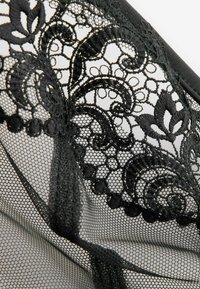 Next EMBROIDERED - Triangel-bh - black