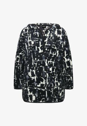 Fleece pullover met capuchon, voorzien van een zwart-wit abstract patroon, rits aan de voorkant en grote buidelzak. Zachte textuur, ontspannen pasvorm.