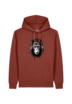 Rostfarbener Hoodie mit einer Grafik eines Gorillas, der große Kopfhörer trägt, mit Farbspritzern auf der Vorderseite.