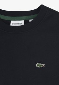 Lacoste CORE TEE - T-shirts - black