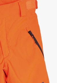 Helly Hansen LEGENDARY PANT UNISEX - Täckbyxor - neon orange
