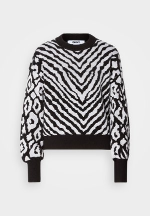 Black and white DKNY sweater featuring a textured zebra and abstract pattern, with a ribbed crew neck and cuffs, and short, wide sleeves.