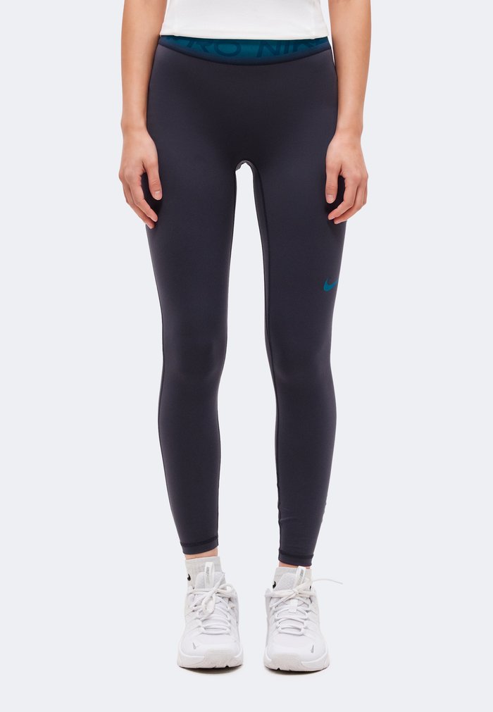 Nike 7/8 TIGHT - Leggings - gridiron/bright spruce