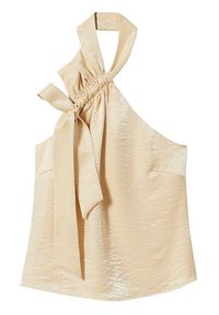 Haut halter beige en tissu brillant. Présente un détail de nœud à l'encolure et deux poches latérales. Texture lisse.