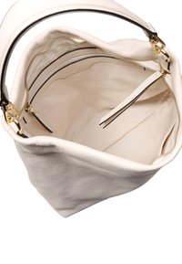 White leather handbag with a textured surface, gold hardware, and a spacious interior featuring a zippered pocket and organizing compartments.