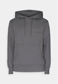 Šedá bavlněná mikina s kapucí, přední kapsou, nastavitelnou šňůrkou na kapuci a vyšitým logem "Calvin Klein Jeans" v tmavě šedé barvě.