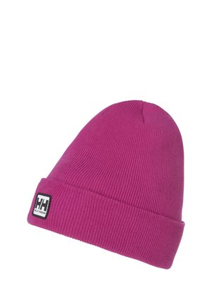 Pink knit beanie with a ribbed texture and a folded cuff, featuring a black and white Helly Hansen logo patch on the front.