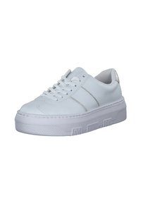 White sneaker with a smooth leather upper, textured side accents, and a thick, ridged rubber sole. Features flat laces and a cushioned collar.