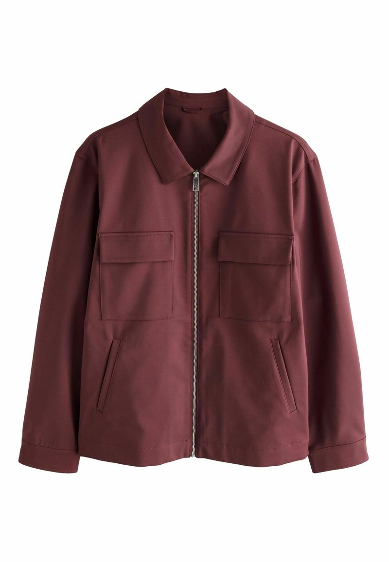 Burgundy jacket made of smooth fabric, featuring a pointed collar, front zip, two chest pockets, and side hand pockets.