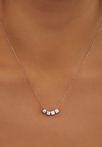 Isabel Bernard Bedel - rose gold-coloured