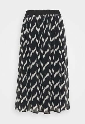Zwart-witte midi-rok met elastische tailleband, doorschijnende stof en abstract zigzagpatroon over de hele rok.