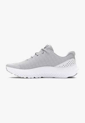 Gray athletic shoe with a breathable mesh upper, white cushioned sole, textured patterns, and reinforced stitching along the edges.