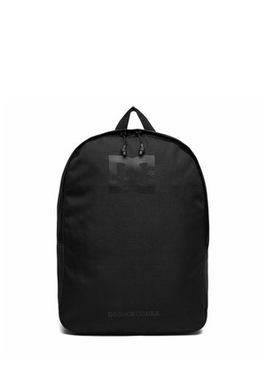 Black DC branded backpack with top handle and two zipper pulls on main compartment against a white background.
