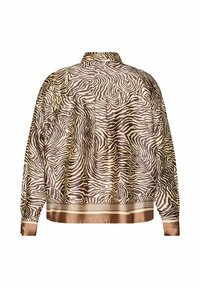 Bomberjakke med zebra-mønster i beige og brun, med satinfinish, ribstrikkede ærmekanter og ensfarvet bånd ved kanten.