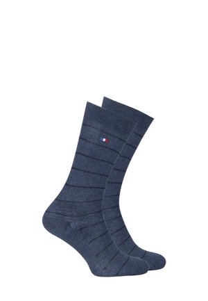 Chaussettes bleu marine avec des rayures horizontales bleu foncé. Fabriquées en matériau doux, elles présentent un haut à revers et un petit logo tricolore.