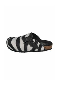 Zebra-patterned clogs with a black buckle. Made of soft material, featuring a cork sole and a round toe design. Black and white color scheme.