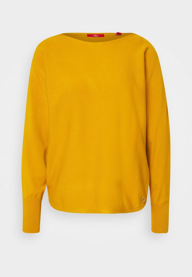 Keltainen neulepusero, jossa on pyöreä pääntie, pitkät hihat ja ribbaatut hihansuut. Alhaalla oikealla on pieni logo. Pehmeä rakenne.