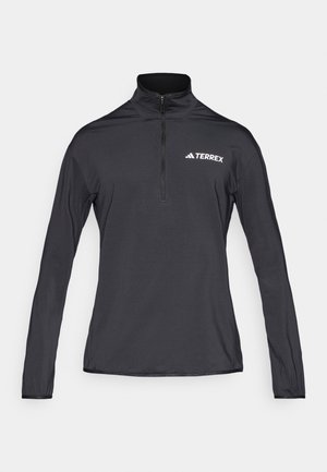 Pullover nero a maniche lunghe con collo alto, zip a un quarto e logo bianco "Terrex" sul lato sinistro del petto. Tessuto liscio e leggero.