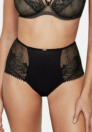 Culotte noire taille haute avec inserts en dentelle, motifs brodés et bords festonnés, avec un accent décoratif central.