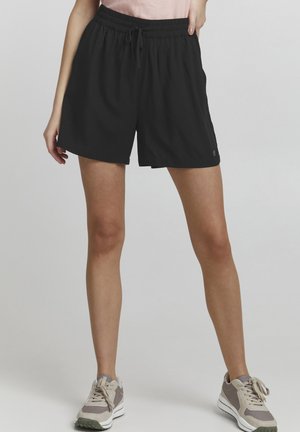 Zwarte, lichte shorts met een elastische tailleband en koord, met een losse pasvorm en gladde textuur. Geen opvallende patronen of accenten.