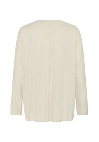 Haut beige à manches longues, coupe ample, avec un col rond, montré de dos sur fond blanc.