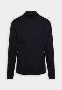 Long-sleeve polo shirt in solid navy fabric with a classic collar and stitch detailing at the hems, offering a smooth, clean appearance.