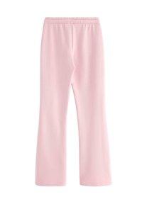 Roze uitlopende joggingbroek met elastische tailleband, gemaakt van zacht materiaal, met een gladde textuur en zonder zichtbare patronen of accessoires.