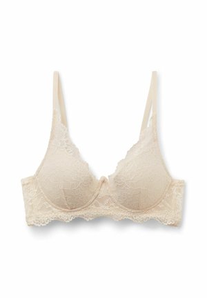 Spitzen-BH in hellbeige mit gepolsterten Körbchen, dünnen verstellbaren Trägern und floralen Musterdetails, mit gezackten Spitzenrändern.