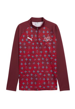 Bordeauxrotes Langarm-Halbzip-Shirt mit rotem und grauem Kreuzmuster, Puma-Logo auf der rechten Brust und Emblem des Schweizerischen Fussballverbands auf der linken Brust.