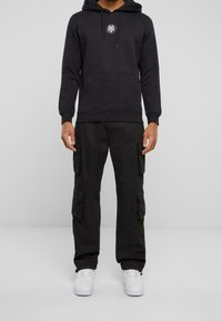 Mister Tee Jersey con capucha - black