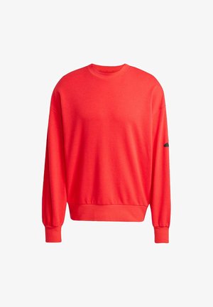 Roter Sweatshirt aus Baumwolle, mit Rundhalsausschnitt, langen Ärmeln mit gerippten Bündchen und geripptem Saum. Mit einem schwarzen Akzent am Ärmel.