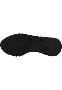 Suela de zapato de goma negra con un patrón ondulado, que presenta una superficie texturizada para mayor agarre. Bordes redondeados y una sección central lisa.