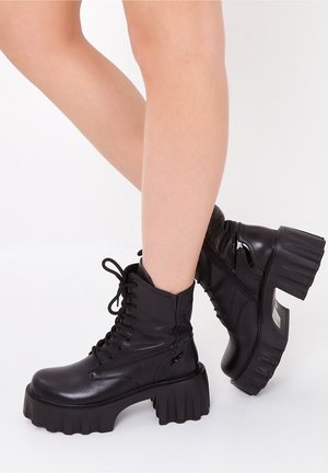 Platform ankle boots - black